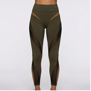 Leggings de yoga taille haute pleine longueur avec empiècements transparents découpés, couleur vert olive uni, en Spandex et Polyester, conception sans couture - Product Image 1