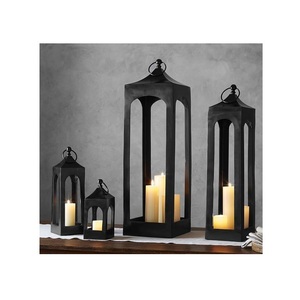 Artistic metal <b>candle</b> <b>lantern</b> suitable for stylish decorative arrangements in homes patios and event environments - Product Image 3