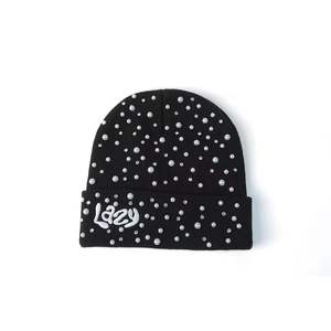 หมวกไหมพรมถักลายแจ็คการ์ดสีพื้นแบบสบายๆ ป้องกันหู อุ่นสำหรับฤดูหนาว พร้อมโลโก้แบบกำหนดเอง - Product Image 5