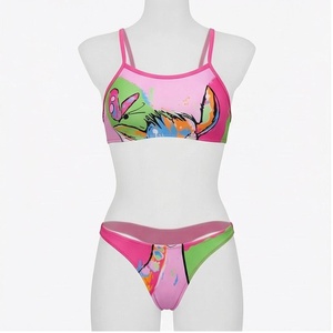 Ensemble de yoga 2 pièces imprimé papillon bleu avec finition dorée, body à col en V profond et jupe portefeuille longueur genou - Product Image 1