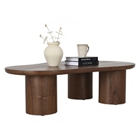 Table basse moderne en bois de noyer au design organique, base à trois cylindres, meubles de salon NESTNORDIC