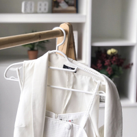 Cintres à vêtements modernes en plastique PP écologique à double niveau pour bébés, organisateur de vêtements multifonctionnel pour armoire et salon, vente en gros