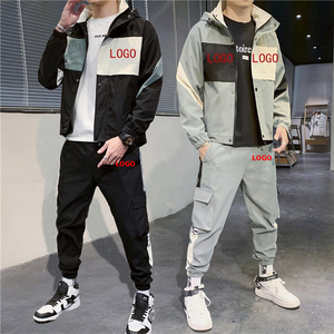 Ensemble de costumes pour hommes décontractés avec logo personnalisé, coupe-vent en épissure, survêtement à fermeture éclair, vêtements de sport, coupe-vent élégants 2 pièces - Product Image 1