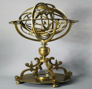 Intricate brass armillary sphere globe on a wooden base with month and zodiac bands, available at wholesale prices. - Product Image 6