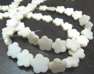 Cuentas de nácar natural en forma de estrella de 12 mm, hebra de 16 pulgadas de largo - Product Image 1