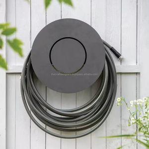 Unique Iron Hose Wall Mounted Holder For Designer Homes Providing Decorative And Practical Use - Product Image 1