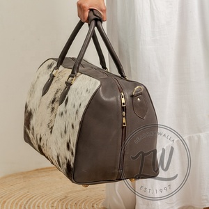 กระเป๋าเดินทางหนังวัวสำหรับผู้ชายและผู้หญิง - Product Image 5