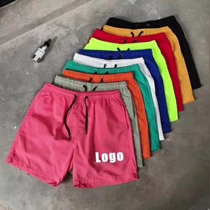 <b>Men</b> Solid Color Quick Dry Swim <b>Trunks</b> With Drawstring Front Logo Regular Fit Woven Polyester Shorts - Product Image 1