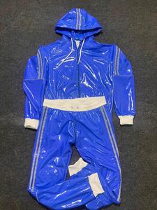 Ensemble de survêtement bleu brillant à capuche pour homme – Coupe-vent sportif léger et imperméable en nylon, style streetwear, idéal pour l'hiver (ODM) - Product Image 1
