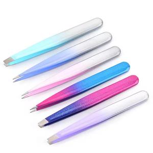 Pinzas para pestañas de acero inoxidable con punta suave y mango degradado, herramientas de maquillaje en rosa, azul y morado - Product Image 1
