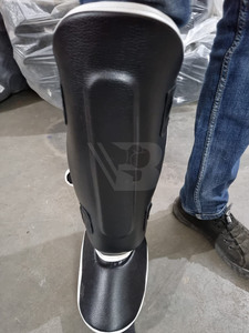 Espinilleras Ajustables de Cuero Ecológico Personalizadas OEM para Adultos, Transpirables y Ligeras, para Entrenamiento de Muay Thai, MMA, Kickboxing y Boxeo - Product Image 4