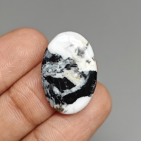Cabochon ovale en buffle blanc pour la fabrication de bijoux 24x17x4 mm. 13 Ct. E1243