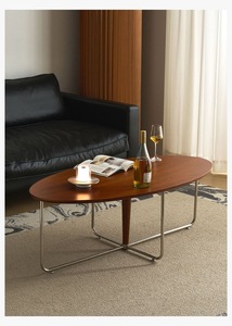 Table basse elliptique minimaliste moderne avec plateau noir mat et pieds tubulaires chromés – Meuble de salon durable et écologique - Product Image 3