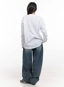 กางเกงยีนส์แฟชั่นทรงดินสอสำหรับผู้ชาย สไตล์วินเทจ ล้างสีแบบ Monkey Wash พร้อมป้ายหนัง ทรงเข้ารูปแบบลำลอง - Product Image 2