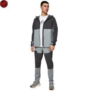 Ensemble de survêtement coupe-vent pour homme, design personnalisé, avec vestes zippées de haute qualité et pantalons de jogging en nylon - Product Image 1
