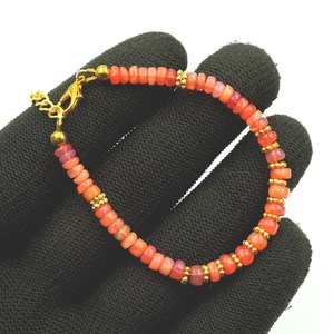 Bracelet en perles d'opale d'Éthiopie naturelle orange HAYAAT GEMS |   Bijoux d'anniversaire de luxe en pierres précieuses multicolores AAA, octobre - Product Image 1