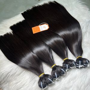 Venta al por mayor de mechones de cabello humano de color natural # 1B hueso recto trama Super doble dibujado donante de cabello joven vietnamita - Product Image 1