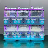 Promotion : Machine à griffes 4 joueurs pour centre de jeux et salle d'arcade, avec date personnalisable, 220V, installation facile, distributeur de poupées