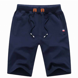 Shorts Bermuda en coton bleu marine pour homme avec cordon de serrage à la taille et poches latérales, style décontracté - Product Image 1