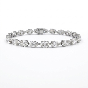 กำไลข้อมือเพชรแพลตตินั่ม PT950 สุดหรู น้ำหนัก 15 กรัม รูปทรงวงรีและหยดน้ำ ประดับเพชรแบบหนามเตย ได้รับการรับรองจาก IGI ของขวัญเครื่องประดับชั้นดี - Product Image 1
