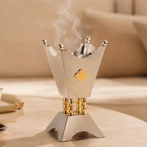 Luxurious <b>Silver</b> And Gold Crown Metal Incense <b>Burner</b> With Sleek Metallic Finish Emits Elegant Smoke For A Regal Ambience - Product Image 1