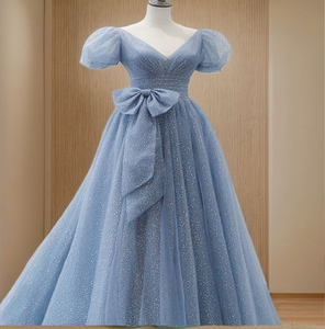 Vestido azul brillante con corte en A, con lazo y mangas abullonadas, disponible a precios de mayorista para ocasiones especiales. - Product Image 1