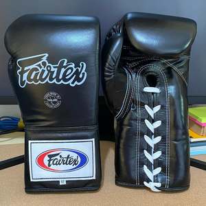 Fabrication de gants de boxe sur mesure de haute qualité, design OEM, idéaux pour l'entraînement MMA, Kickboxing, Muay Thai - Product Image 1