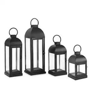Ensemble de 4 lanternes décoratives en métal noir moderne pour intérieur, extérieur, maison, jardin et mariage - Product Image 1