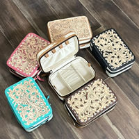 Boîte à bijoux vintage artisanale en cuir de vachette véritable avec un élégant motif floral, étui de rangement pour bijoux.