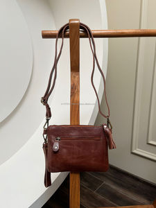 Nueva llegada occidental estampado cuero de vaca nuevo elegante bolso tallado a mano de cuero borla Boho pelo en ocultar Sling Bag - Product Image 5