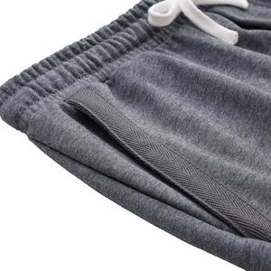 Shorts de sport décontractés pour hommes, mi-hauts, en toile 100 % polyester de qualité supérieure, écologiques, respirants, imperméables, séchage rapide, teinture unie - Product Image 2