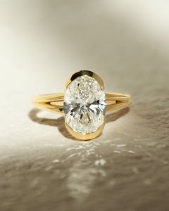 แหวนหมั้นเพชรทรงรี 3 กะรัต แบบฝังครึ่งวง ขอบทองคำขาว 14K ชุบโรเดียม ได้รับการรับรองจาก IGI ดีไซน์แยกก้าน - Product Image 1