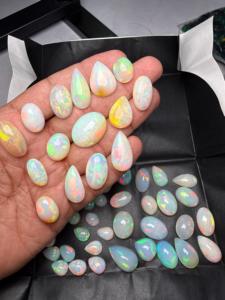 Opale d'Éthiopie naturelle blanche de qualité supérieure AAA+ 401,80 CT, 49 pièces, formes mélangées, cabochon, jeu de couleurs, pour la fabrication de bijoux/les collectionneurs Zehra - Product Image 1