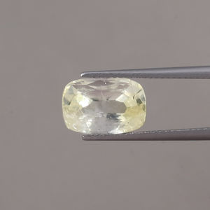 ไพลินสีเหลือง ได้รับการรับรองจาก IGI เกรด AAA พลอยแท้ธรรมชาติ ขนาด 10x9 มม. รูปทรงคุชชั่น น้ำหนัก 6.93 กะรัต แบบเม็ดเดี่ยว เปลี่ยนสีได้ ผ่านการเคลือบแว็กซ์/น้ำมัน - Product Image 1