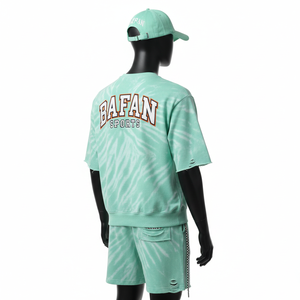 ชุดเซ็ตเสื้อสเวตเชิ้ตและกางเกงขาสั้นผ้าฟลีซผสมคอตตอนโพลีเอสเตอร์พรีเมียม สีเขียว ย้อมสี ให้สัมผัสนุ่ม พร้อมปักโลโก้ตามสั่ง - Product Image 4