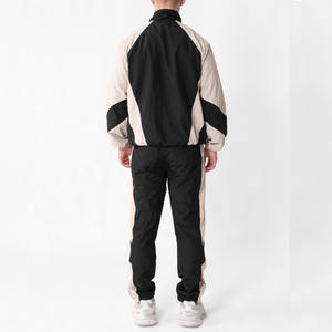 Ensemble de survêtement coupe-vent pour homme, veste légère à fermeture éclair, pantalon de jogging, vêtements de sport, logo personnalisé OEM, vente en gros - Product Image 5