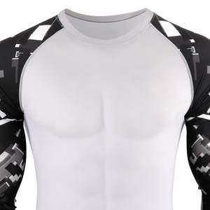 Camisetas de compresión para gimnasio para hombre con tela flexible, estructura que se adapta al cuerpo y costuras duraderas para entrenamientos intensos - Product Image 4