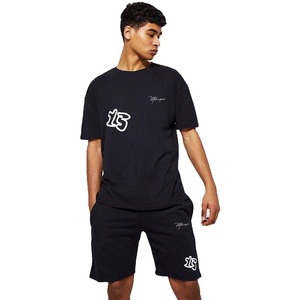 Conjunto de camiseta y pantalones cortos de verano para hombre con logotipo personalizado, 100% algodón, transpirable, ropa urbana, servicio OEM, pedidos al por mayor - Product Image 1