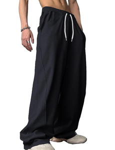 Pantalon de jogging streetwear noir uni personnalisé pour homme et unisexe, coupe ample et décontractée, taille élastique avec cordon de serrage, haute qualité - Product Image 4