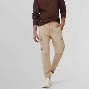 Pantalon de survêtement cargo beige pour homme, taille élastique avec cordon de serrage, plusieurs poches, décontracté, pour l'automne, en coton mi-lourd - Product Image 1
