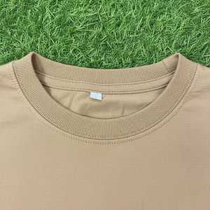 เสื้อยืดโอเวอร์ไซส์ลายกราฟิกสไตล์สตรีทสำหรับผู้ชาย วัยรุ่น ผ้าคอตตอนหนา พิมพ์ลายหน้าอกโดดเด่น คอกลม รับผลิตตามแบบ OEM ขายส่งจำนวนมาก - Product Image 3