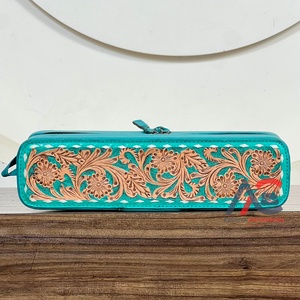 Nouveaux étuis de luxe 2026 en cuir de vachette véritable repoussé pour fer à boucler et lisseur, pochettes de rangement de voyage résistantes à la chaleur - Product Image 1