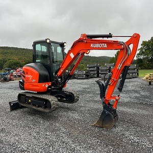Mini-excavatrice KX018-4 orange sur chenilles en bon état de marche avec godet et lame, moteur 110 kW, garantie 1 an - Product Image 4