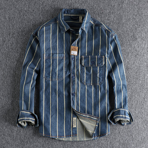 Chemise décontractée pour homme en denim tendance 2024, col rabattu, couture ouverte, rayée, bleu 1 - Product Image 1