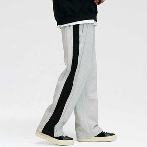 Pantalon de survêtement gris pour homme avec bande latérale noire, taille élastique, décontracté, respirant, en coton tricoté, pour l'automne - Product Image 2
