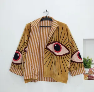Veste artisanale en velours avec applique œil porte-bonheur doré, style bohème chic et artistique pour femme - Product Image 3