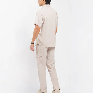 ชุดเซ็ตสองชิ้นพรีเมียมสำหรับผู้ชายจาก REVIBE INDUSTRY เสื้อคอปกแคมป์ 100% ผ้าฝ้าย และกางเกงทรงหลวม สวมใส่สบาย เหมาะสำหรับฤดูร้อน - Product Image 3