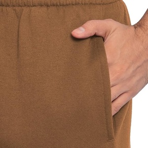 Pantalon de jogging léger et respirant pour homme en polyester et élasthanne noir, à taille élastique, avec braguette zippée et poches latérales, idéal pour le printemps - Product Image 2