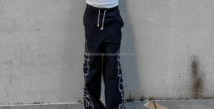 Pantalon de survêtement décontracté pour hommes 100% pantalon de survêtement en nylon broderie personnalisée sérigraphie logo coupe-vent léger coupe ample - Product Image 4