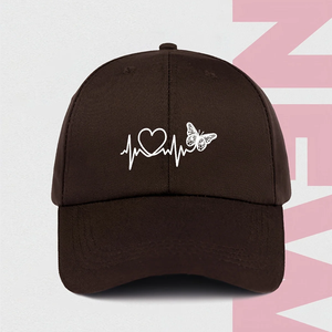 Una gorra de béisbol minimalista con diseño de estampado de latido de mariposa en blanco para protección solar y protección contra el sol en deportes al aire libre. - Product Image 4